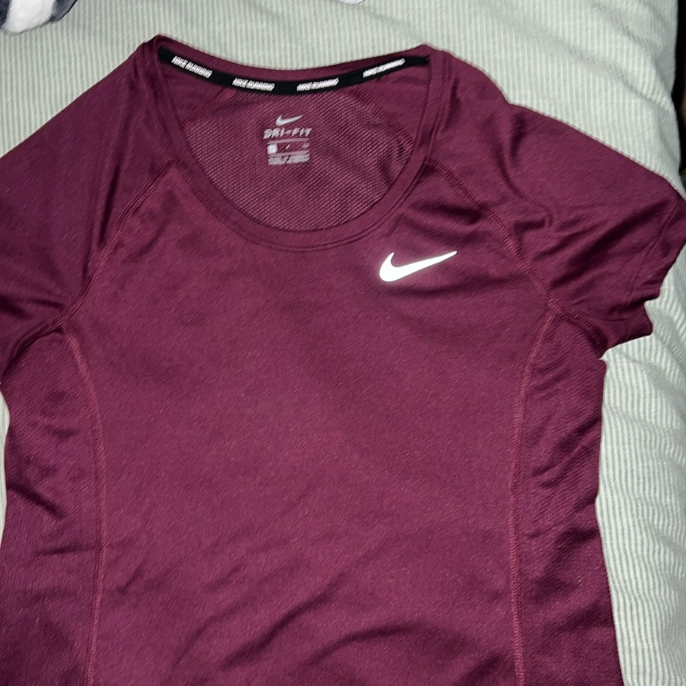 Nike DRI-fit running top maroon size small short sleeves